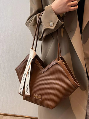 Brown ribbed texture large shoulder bag with white logo straps