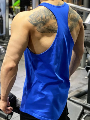 Royal blue performance racerback tank top with graphic detail on back
