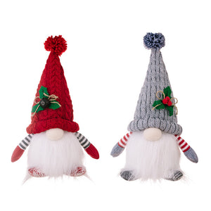 Illuminated knit gnomes in deep red and light gray with festive accents and striped arms.