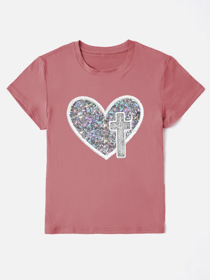 Dusty pink t-shirt with iridescent heart and cross appliqué detail.