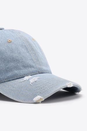 Light blue distressed denim baseball cap with frayed details