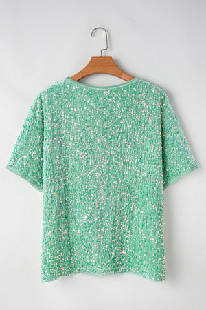 Sequin embellished dolman sleeve top in Gum Leaf green with short sleeves.