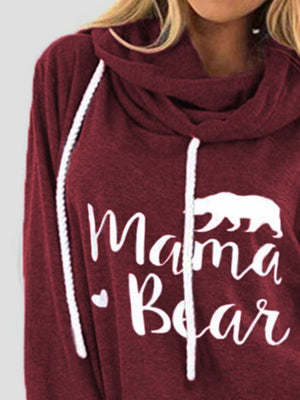 Burgundy cowl neck hoodie with white Mama Bear graphic and drawstring.