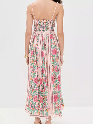 Pink floral maxi dress with sweetheart neckline and smocked bodice.
