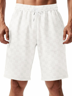 White checkered chino shorts with drawstring waist for men.