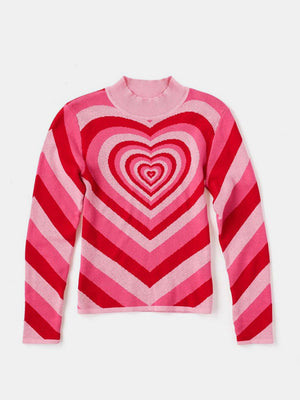 Heartbeat Stripe Mock Neck Knit sweater in pink and red with concentric heart pattern and chevron stripes.