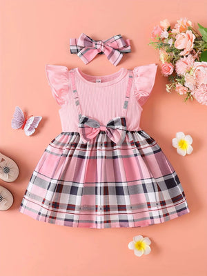 Baby girl pink plaid dress with ruffled cap sleeves and bow detail, includes matching headband.