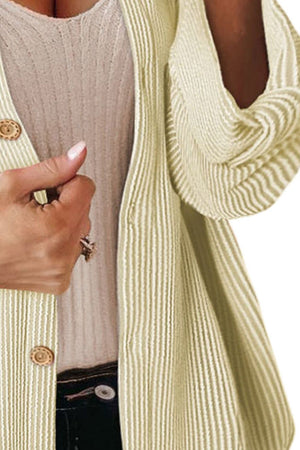 Textured stripe oversized shirt in ivory with button detail and a ribbed tank top.