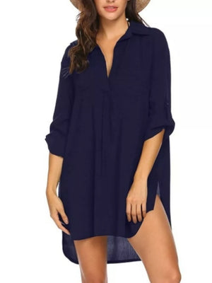 Navy blue oversized collared shirt with roll-tab sleeves and side slits.