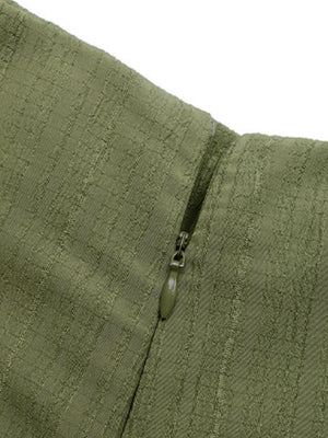 Matcha green skort with textured fabric and side zipper detail