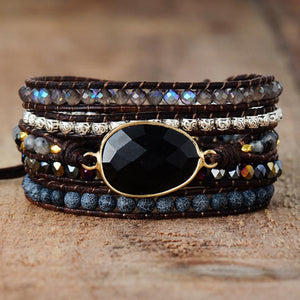Black gemstone and bead wrap bracelet with leather cords and alloy accents.