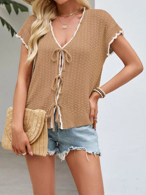 Breezy tie-front knit cardigan in Khaki with white lace trim and short sleeves.