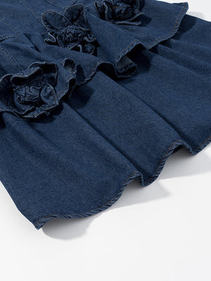 Denim mini dress with floral appliques and ruffled tiers.