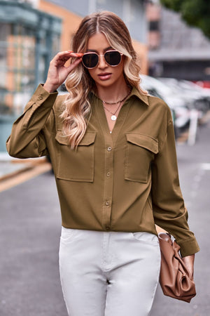 Oversized utility shirt in matcha green with two chest pockets and button front.