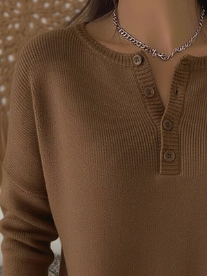 Brown buttoned long-sleeve knit top with a crew neckline and ribbed texture.