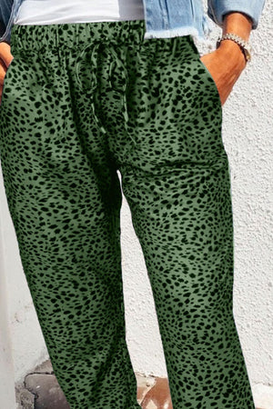 Green leopard print relaxed-fit drawstring trousers with pockets