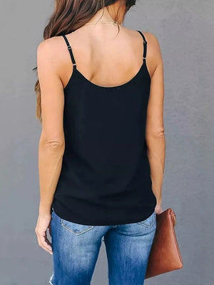 Black cami top with adjustable straps and V-neck detail.
