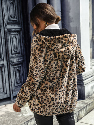 Leopard print sherpa hooded jacket in camel with black trim.
