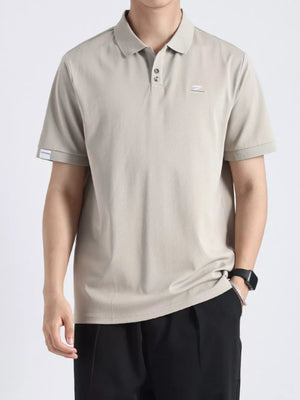 Light gray textured casual polo shirt with button accents and short sleeves.