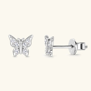 Silver moissanite butterfly stud earrings with clear stones.