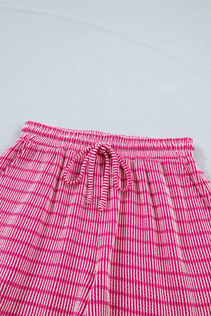 Fuchsia pink striped bikini shorts with drawstring waist