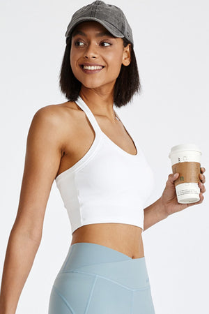 White ribbed halter crop top with a casual cut.