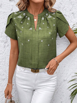 Matcha green embroidered floral keyhole blouse with short flutter sleeves.