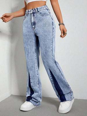 Light acid wash bootcut jeans with split hem detail