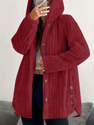 Red button-up fleece jacket with a hood and textured fabric.