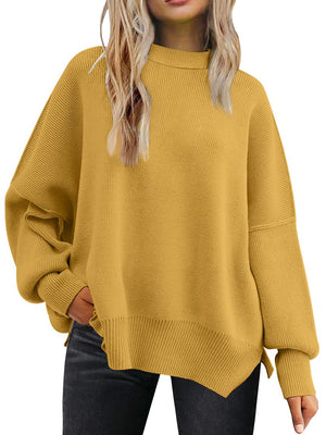 Mustard ribbed-knit relaxed fit sweater with mock neck and balloon sleeves.