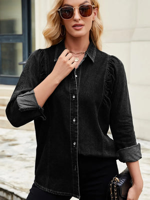 Black denim blouse with ruffled puff sleeves and button front.