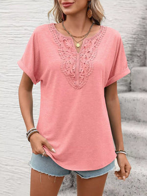 Pink relaxed fit t-shirt with lace neckline detail and cuffed short sleeves.
