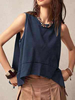 Navy asymmetric tank top with raw edge hem and layered detail.