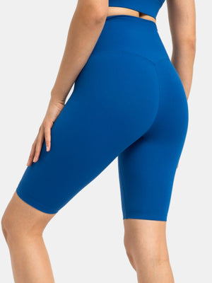 Royal blue active cycling shorts with a high waist and V-shaped seam detail.