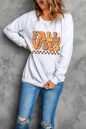 White crewneck sweatshirt with retro Fall Vibes graphic and checkered detail.