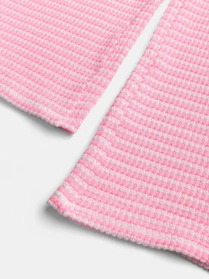 Pink striped maternity wide leg trousers with textured fabric detail.