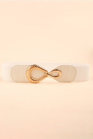 White elasticated waist belt with a sculpted gold buckle and faux leather detail