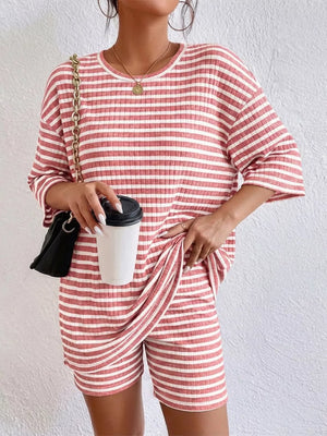 Pink striped two-piece set with elbow sleeves and shorts, ribbed knit fabric.