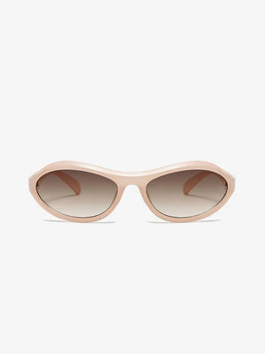 Blush pink sculpted oval lens sunglasses with gradient brown lenses.