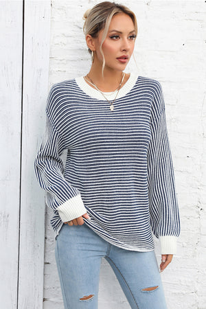 Nautical stripe ribbed knit crewneck sweater with white cuffs and neckline.