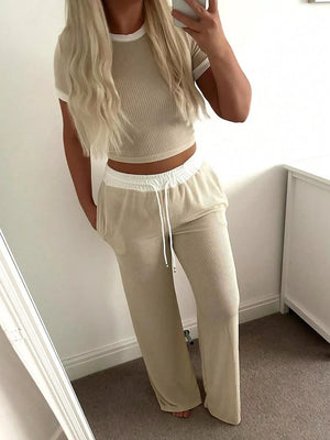 Chic ribbed two-piece set with contrast trim crop top and pants