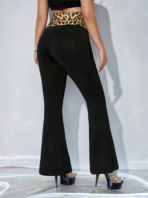 Black flare trousers with leopard print waistband