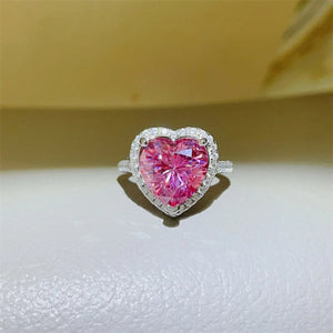Radiant Heart Moissanite Halo Ring in Fuchsia Pink with a diamond-accented band.