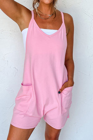 Pink spaghetti strap romper with v-neck and patch pockets