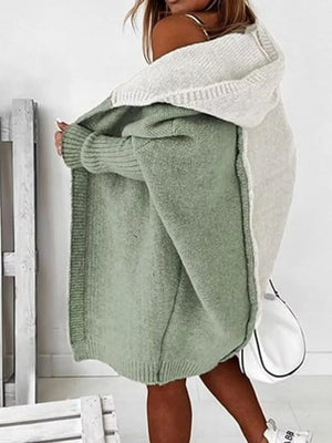 Two-tone hooded knit cardigan in matcha green and cream acrylic with ribbed cuffs and hem.
