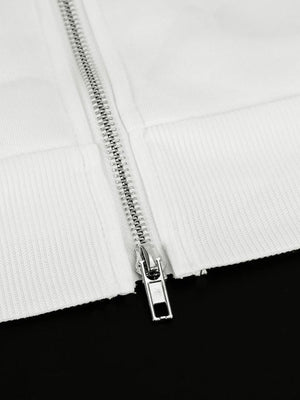 White zip-up hoodie with black stripes and a bow detail, featuring a silver zipper.