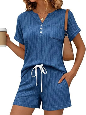 Blue ribbed knit loungewear set with henley neckline top and drawstring shorts.