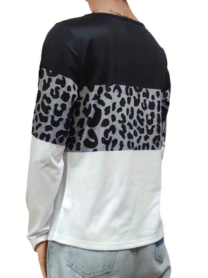 Long sleeve blocked top with leopard print detail in black, grey, and white.