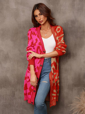 Colorblock leopard knit duster cardigan with button front and pockets in acrylic.