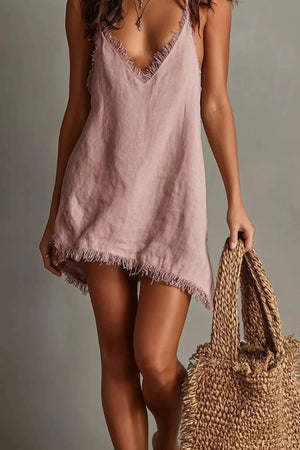 Dusty pink cotton cami dress with V-neck and frayed hem details.